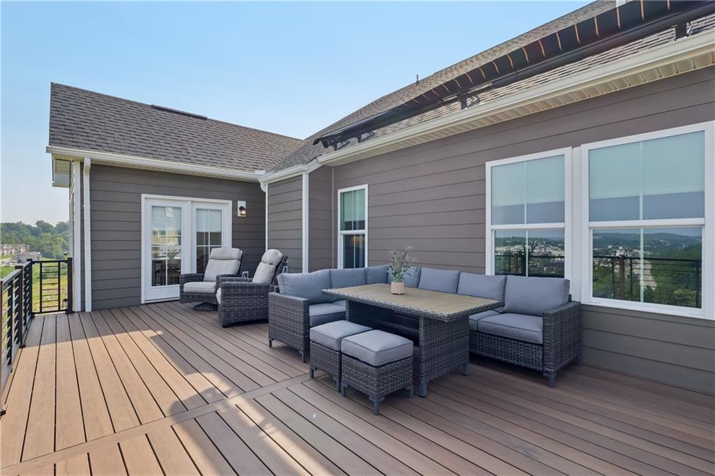 332 Red Bud Lane Washington, PA 15301 - Photo 35 of 47 a outdoor space with patio the couches and a dining table with wooden floor