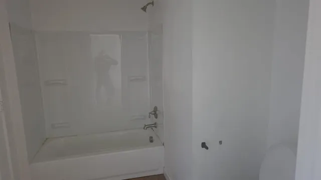 a close up of a bathtub