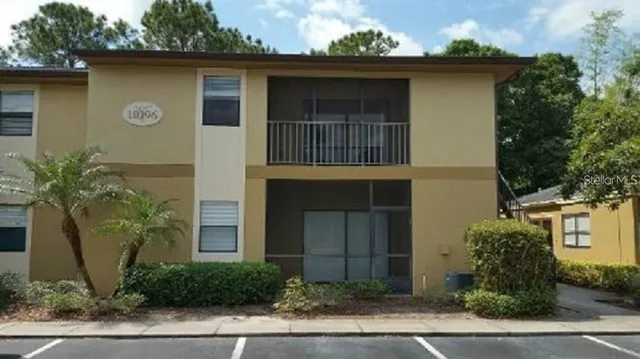 a front view of a house with garage