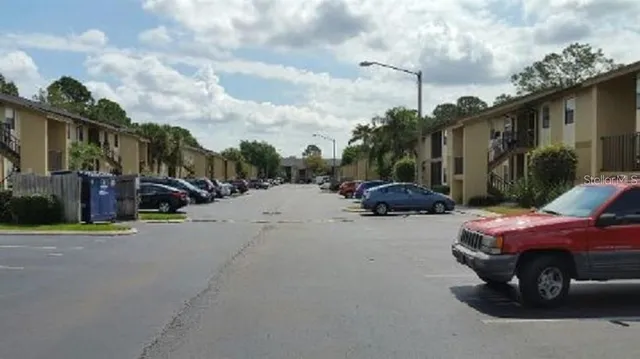 a car parked in front of a house