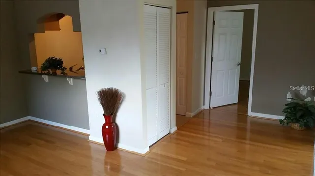 a view of entryway with wooden floor