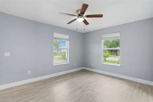 a view of an empty room with a window