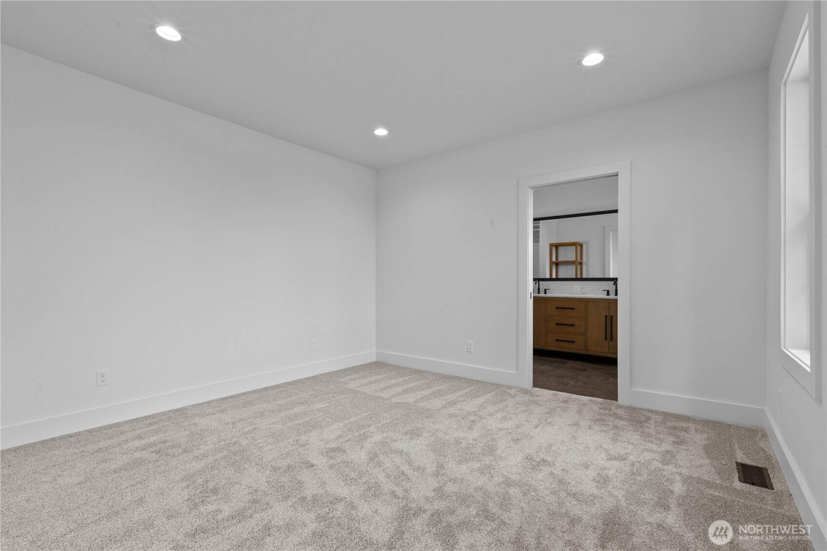 893 Loomis Trail Road Lynden, WA 98264 - Photo 14 of 39 a view of an empty room and a kitchen