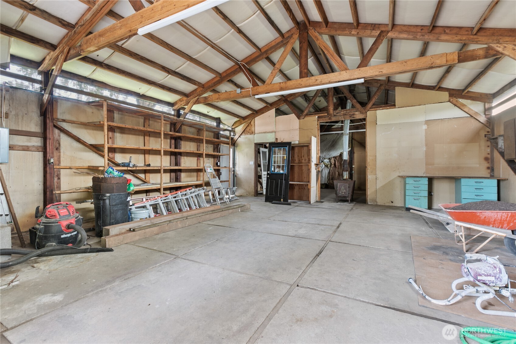 893 Loomis Trail Road Lynden, WA 98264 - Photo 30 of 39 a view of an empty room with wooden floor