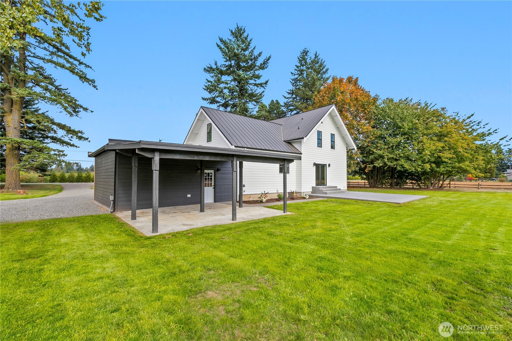 893 Loomis Trail Road Lynden, WA 98264 - Photo 32 of 39 a front view of a house with yard and green space
