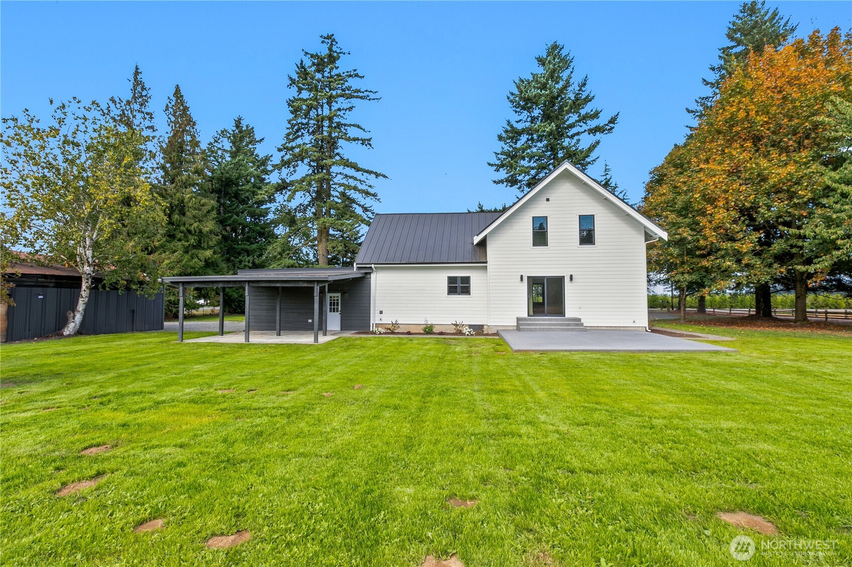 893 Loomis Trail Road Lynden, WA 98264 - Photo 33 of 39 a view of a house with a yard