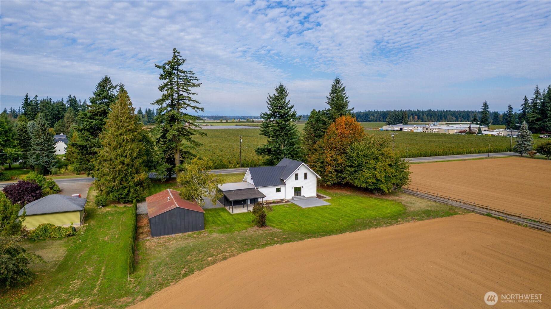 893 Loomis Trail Road Lynden, WA 98264 - Photo 37 of 39 a view of a garden with lawn chairs