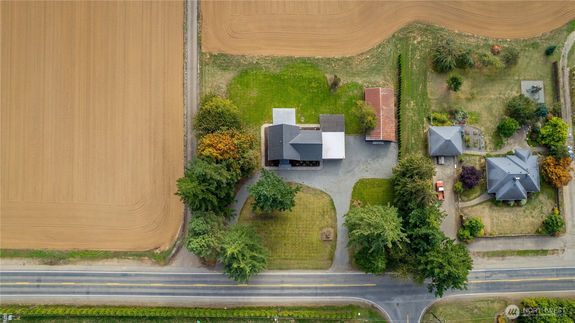 893 Loomis Trail Road Lynden, WA 98264 - Photo 38 of 39 an aerial view of a residential houses with yard