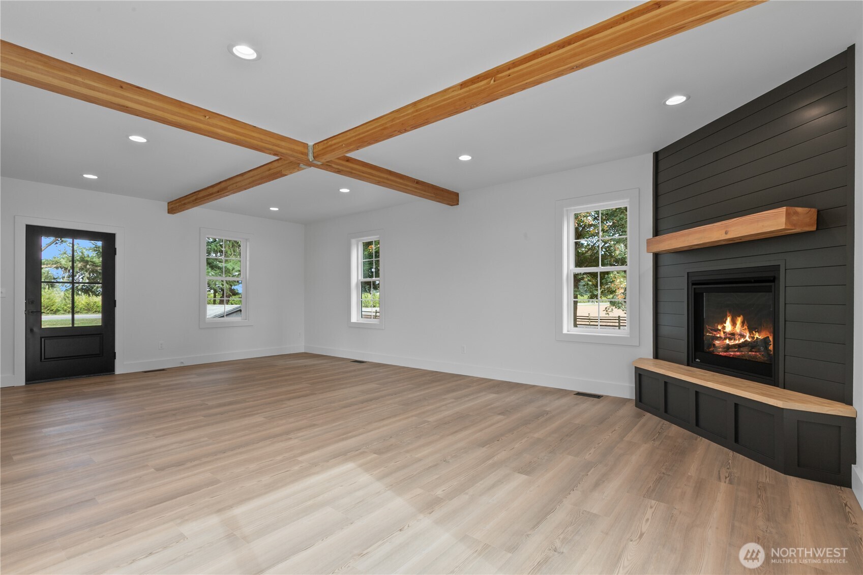 893 Loomis Trail Road Lynden, WA 98264 - Photo 7 of 39 a view of an empty room with window and fire place