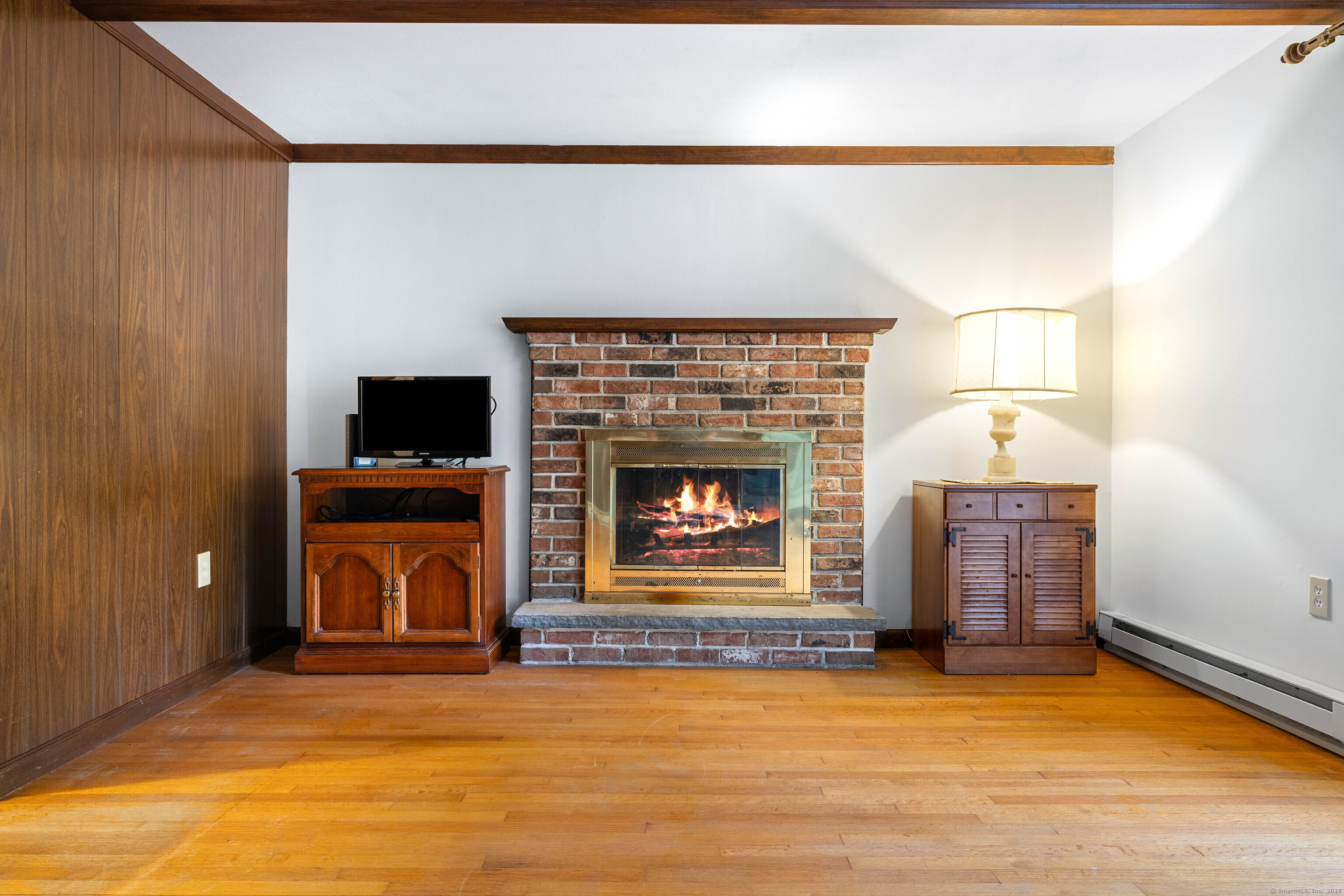 6 Fulmore Drive Waterford, CT 06385 - Photo 12 of 38 a view of room with fireplace and flat screen tv