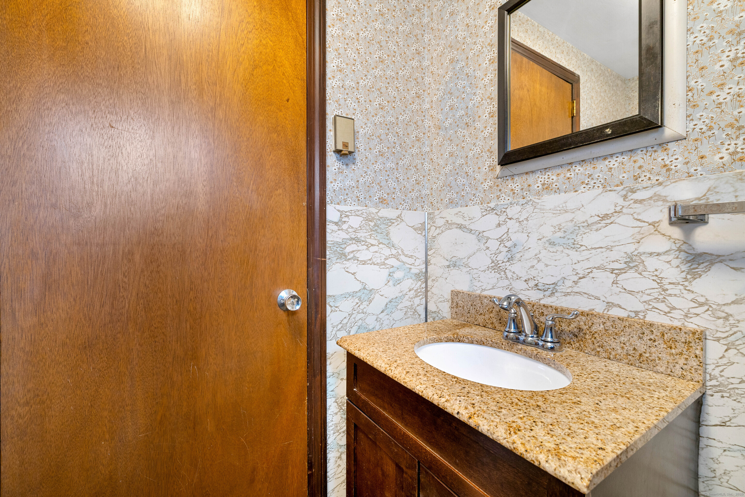6 Fulmore Drive Waterford, CT 06385 - Photo 18 of 38 a bathroom with a sink and a mirror