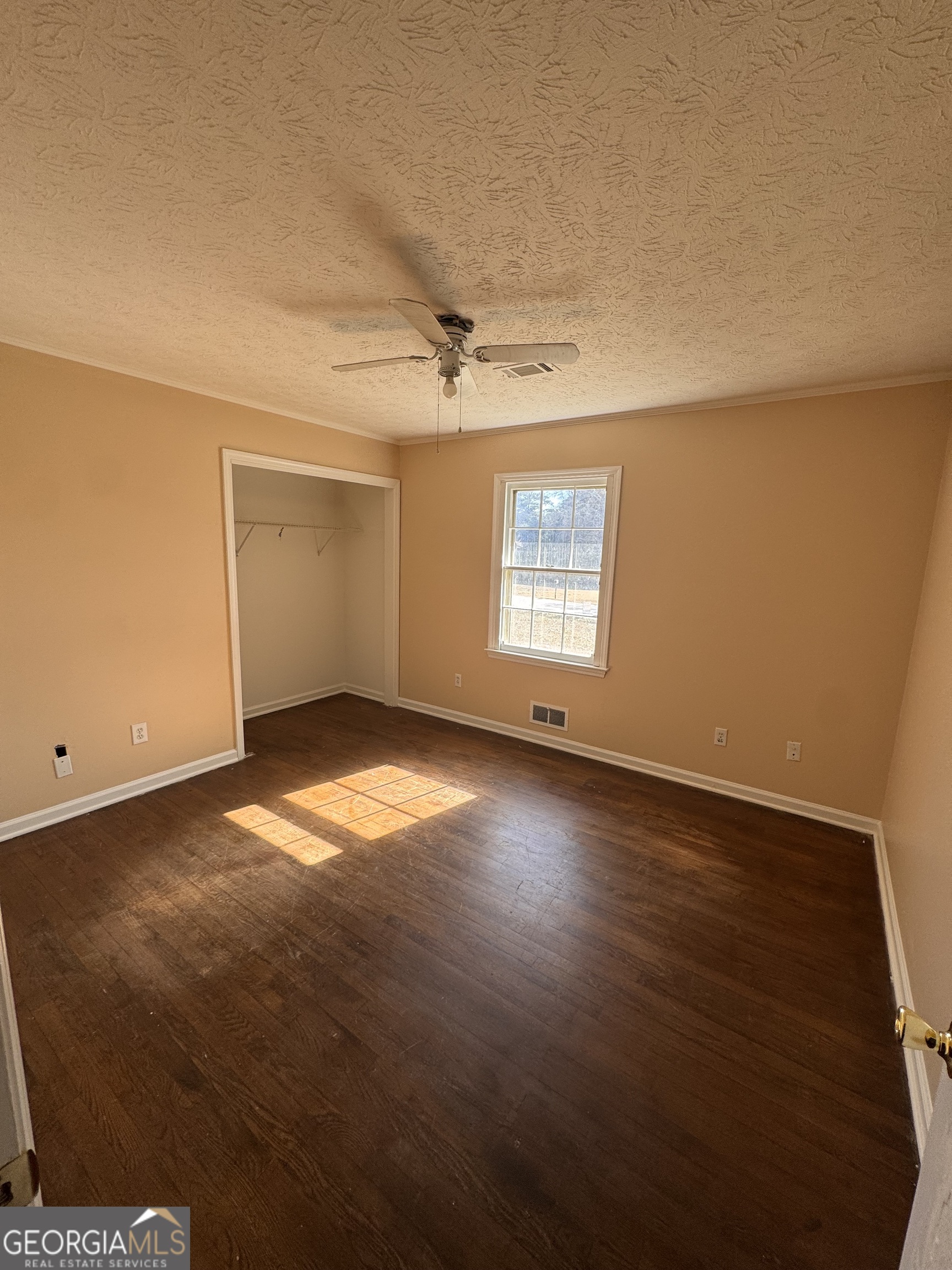 5175 Forest Drive Southeast Covington, GA 30014 - Photo 17 of 30 an empty room with windows