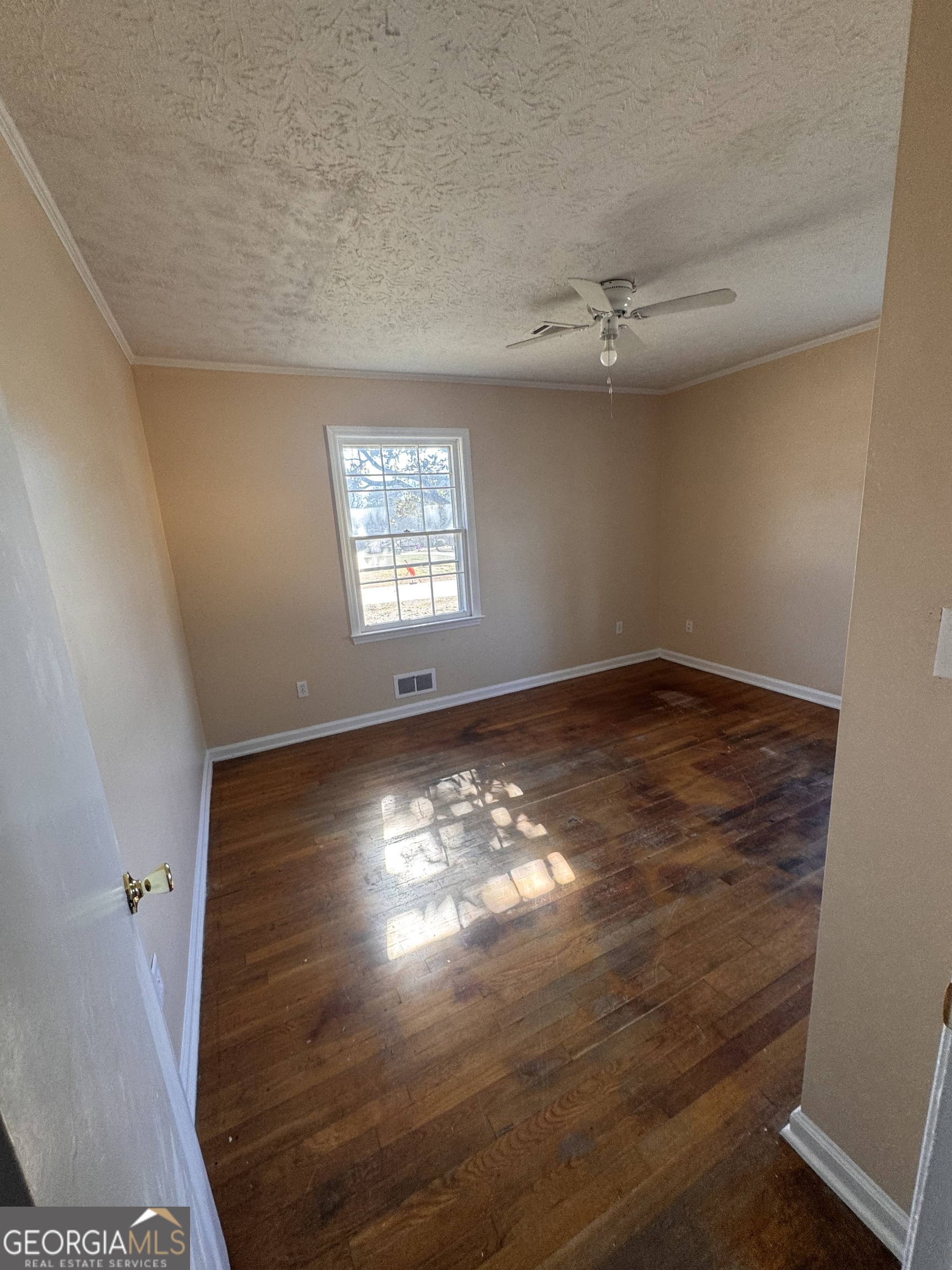 5175 Forest Drive Southeast Covington, GA 30014 - Photo 18 of 30 an empty room with windows