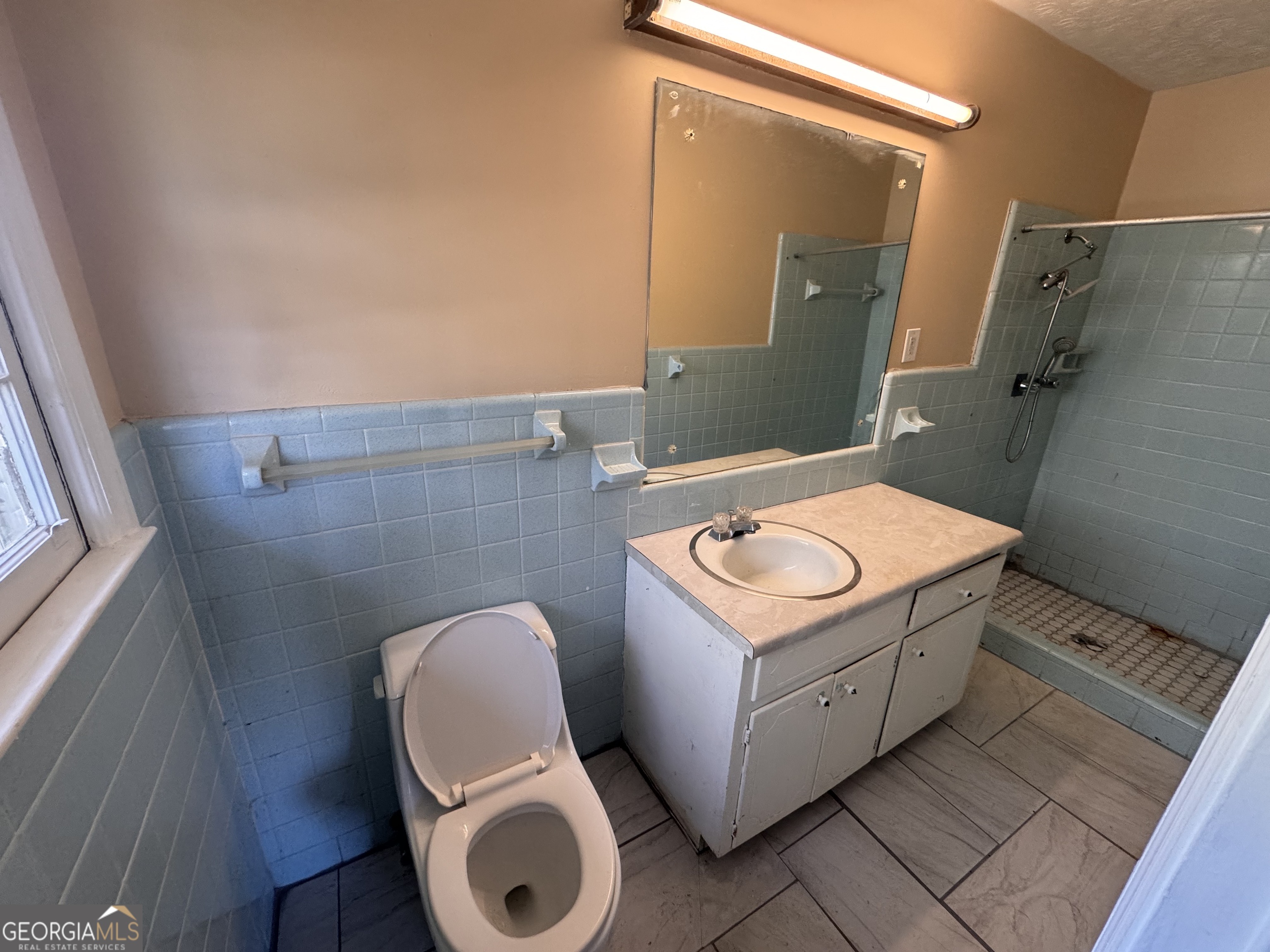 5175 Forest Drive Southeast Covington, GA 30014 - Photo 20 of 30 a utility room with dryer and washer