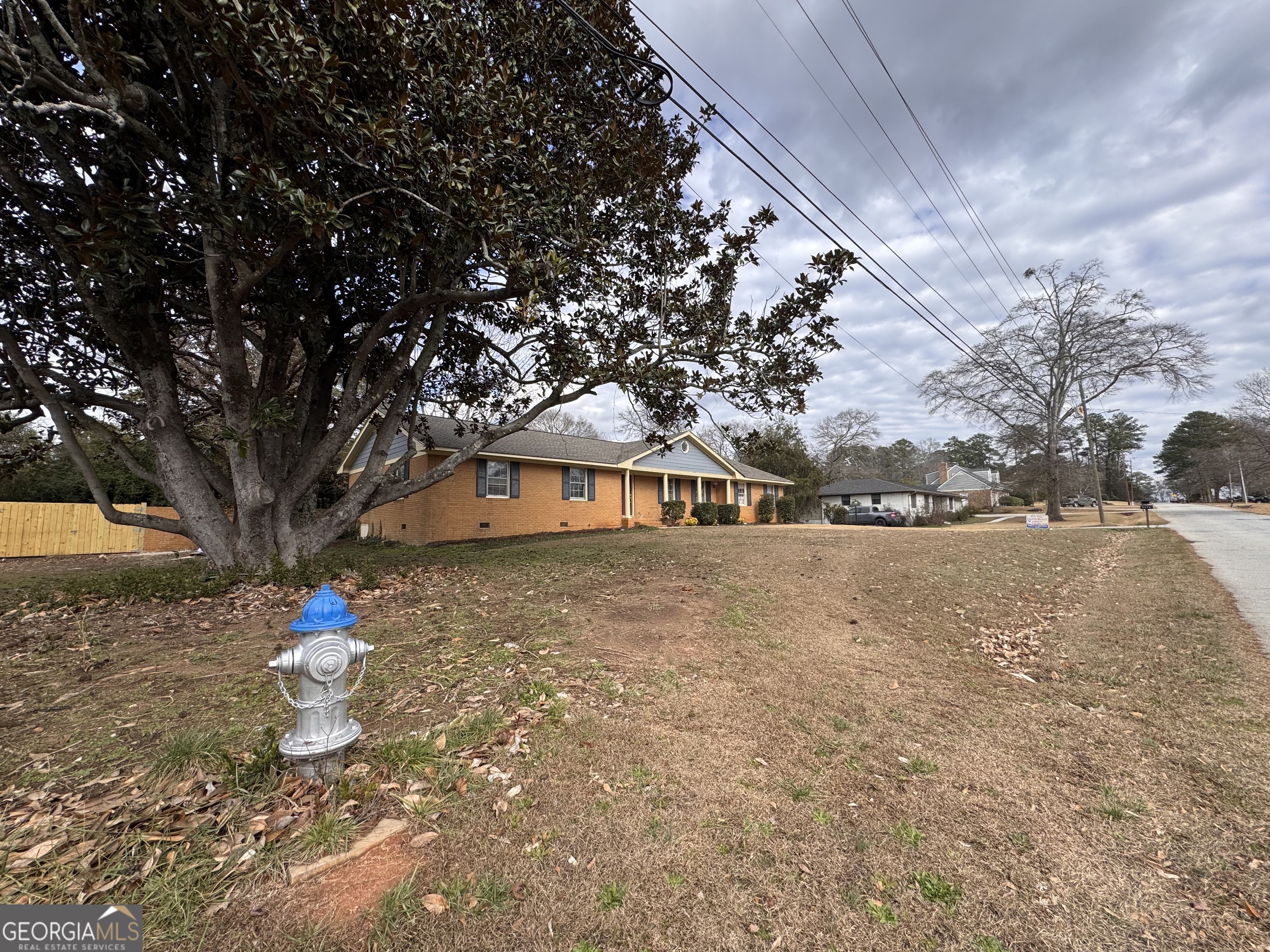 5175 Forest Drive Southeast Covington, GA 30014 - Photo 27 of 30 a front view of a house with a yard