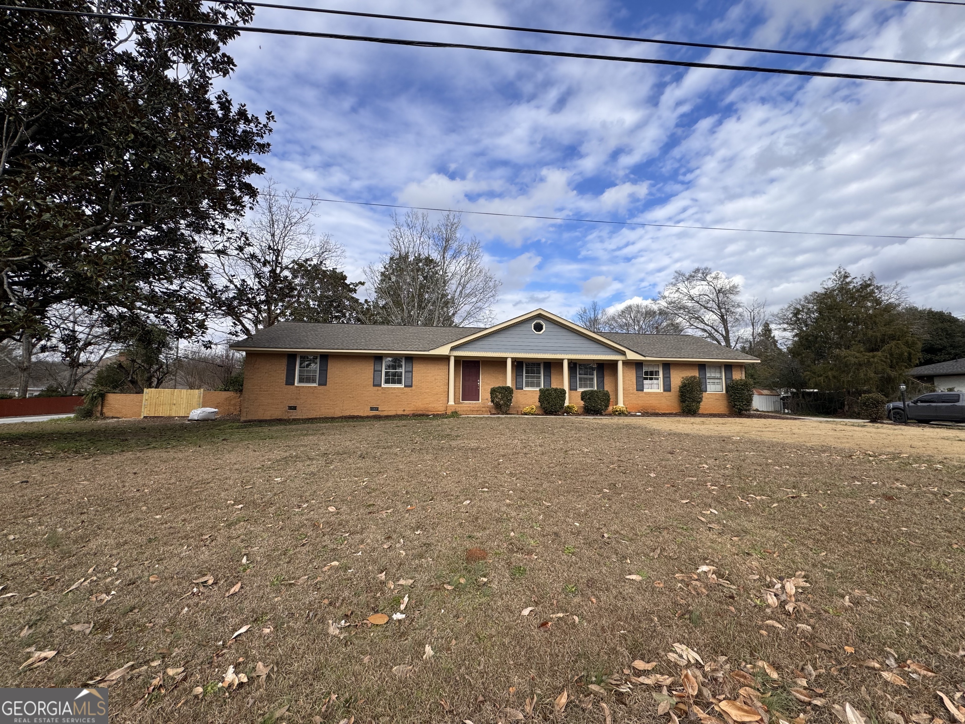 5175 Forest Drive Southeast Covington, GA 30014 - Photo 30 of 30 a front view of a house with a yard