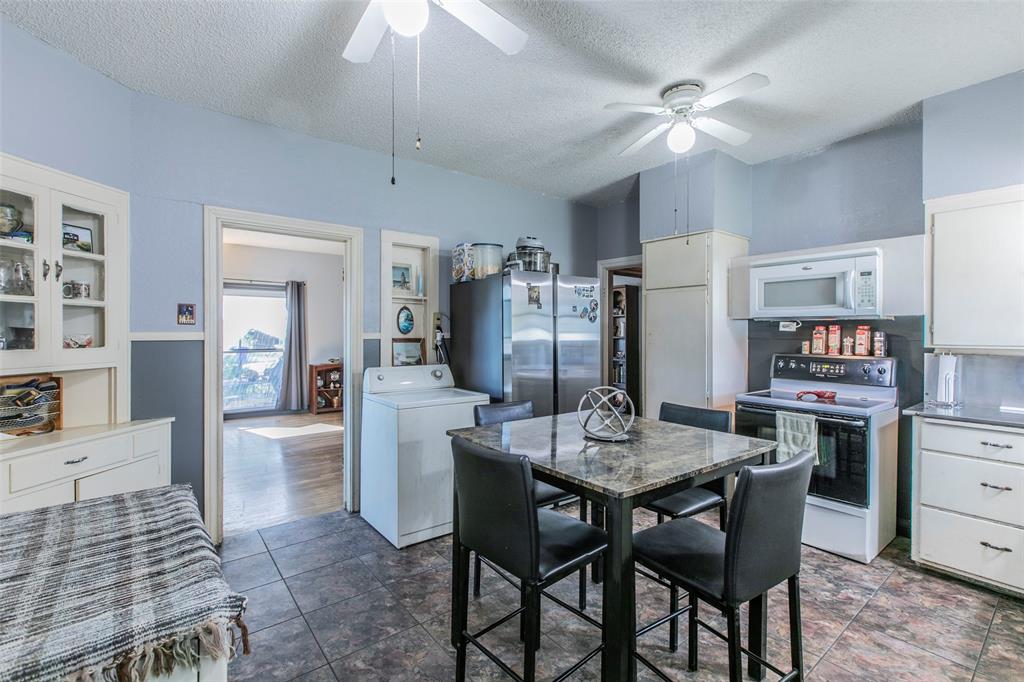 2603 Pine Avenue Waco, TX 76708 - Photo 8 of 23 a dining room with furniture and window