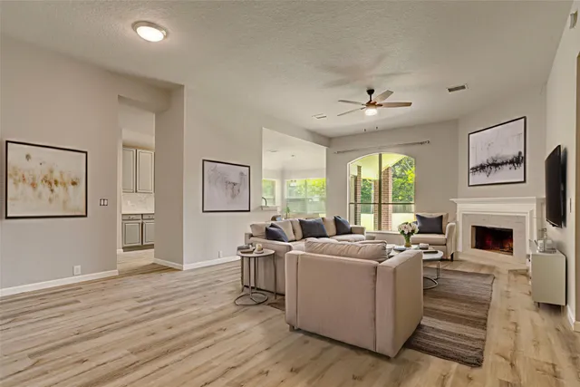 a view of street with houses and trees