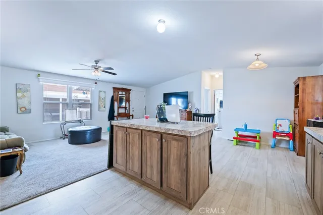 a room with furniture and a flat screen tv