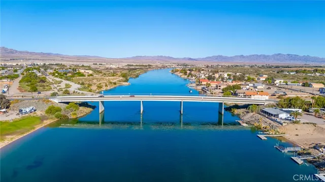 a view of a lake with city