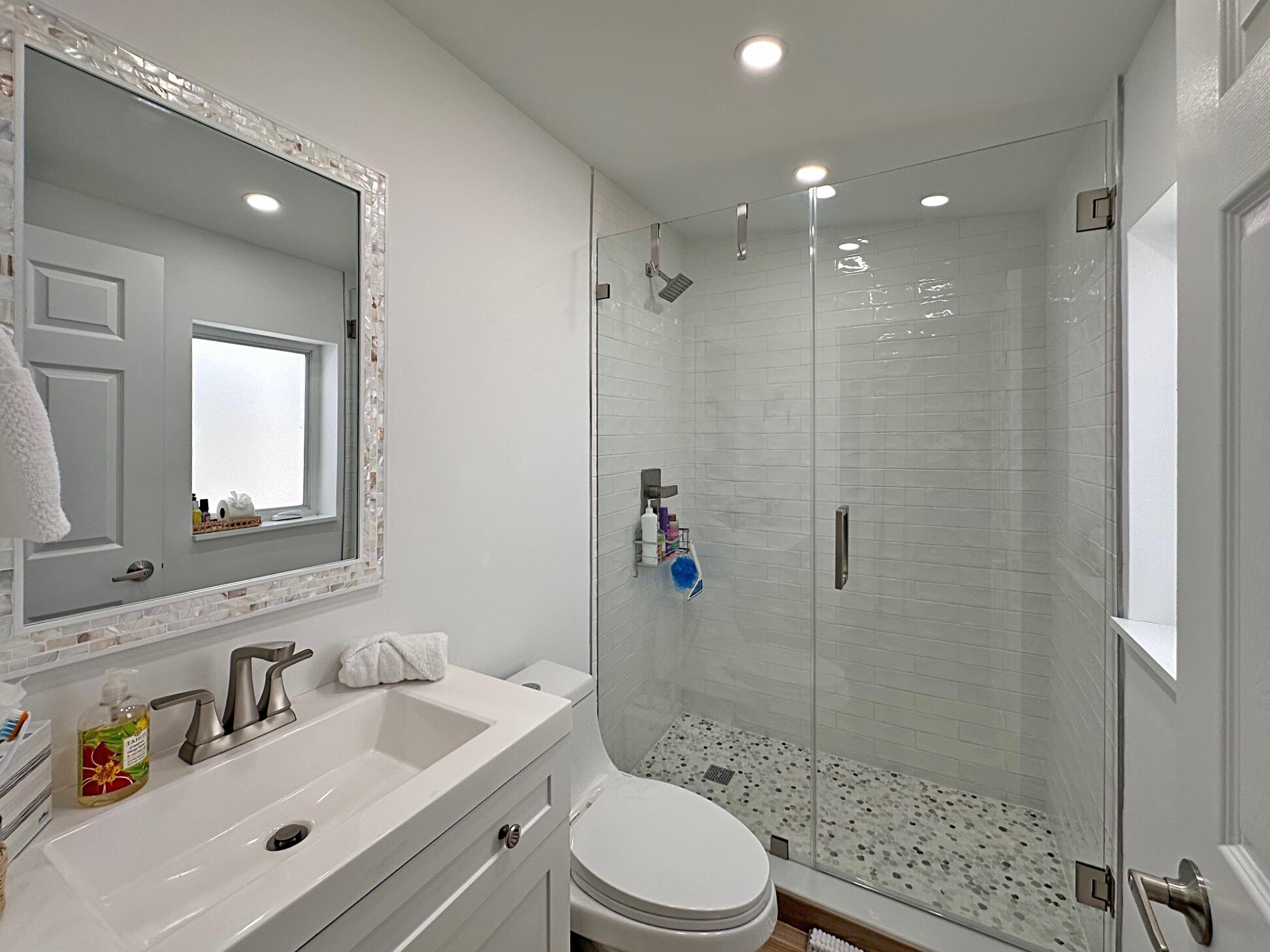 32 Pirates Drive Key Largo, FL 33037 - Photo 12 of 25 a bathroom with a sink a toilet and shower