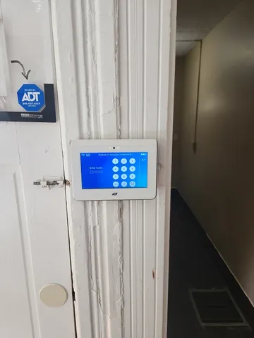 a view of a house with a small yard