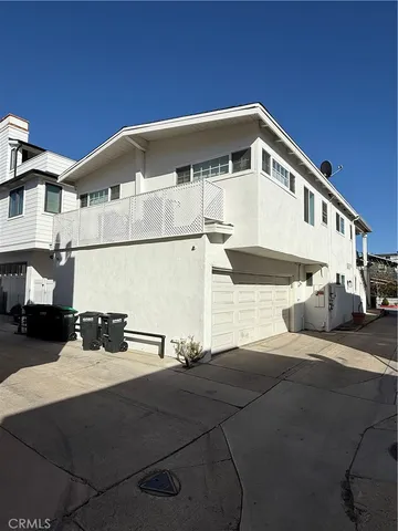 a view of a house with a street