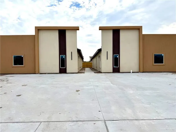 a view of a house with a garage
