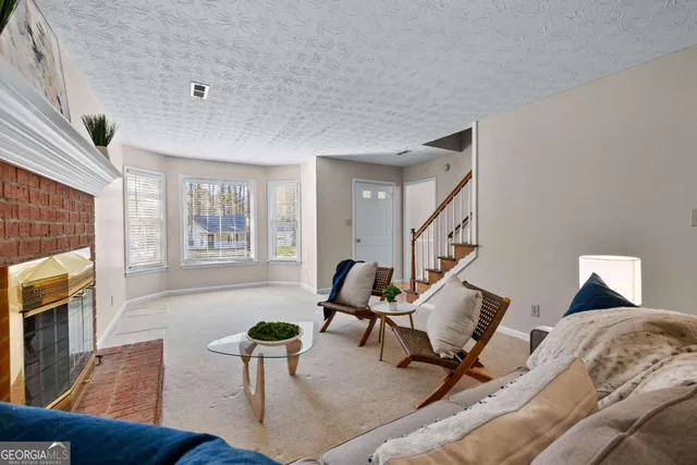 a view of a hallway with a chandelier