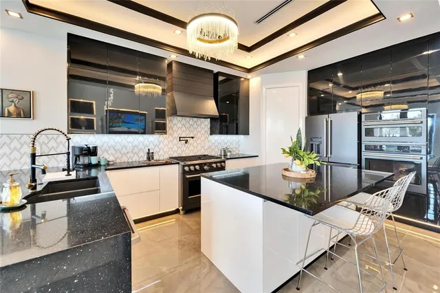 a spacious bedroom with a bed ceiling fan and a rug