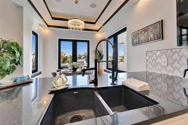 a bathroom with a shower and a sink