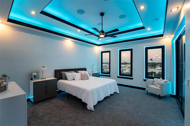 a view of a swimming pool with a lawn chairs