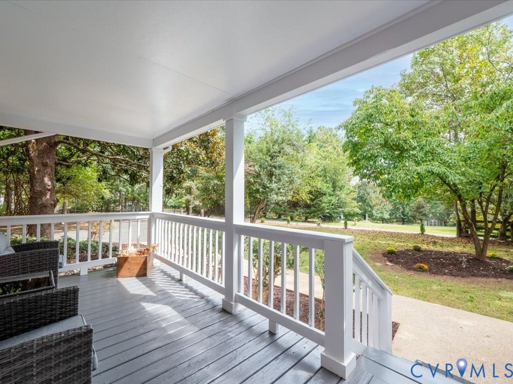 7068 Porters Road Esmont, VA 22937 - Photo 12 of 37 a view of balcony with wooden floor and seating space