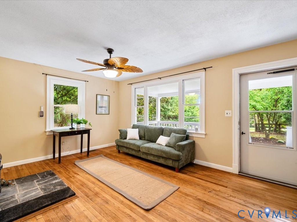 7068 Porters Road Esmont, VA 22937 - Photo 15 of 37 a living room with furniture and a window