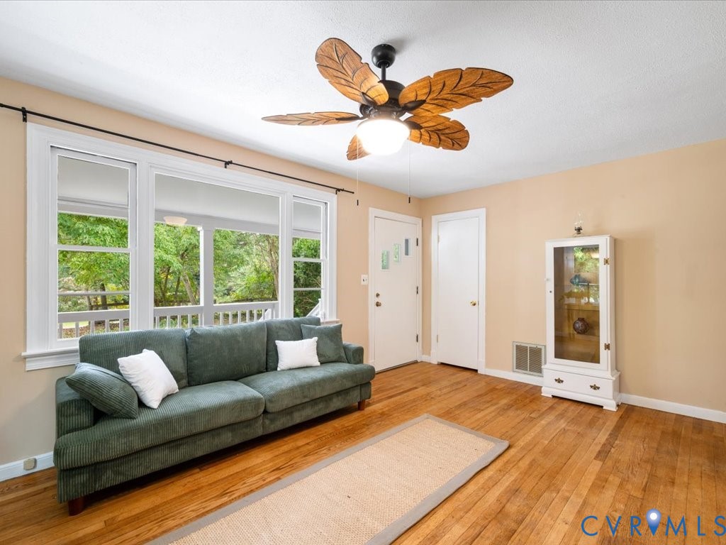 7068 Porters Road Esmont, VA 22937 - Photo 16 of 37 a bedroom with a large bed and a large window