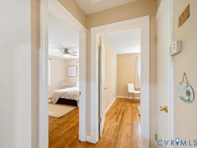 a kitchen with granite countertop a sink appliances cabinets and furniture