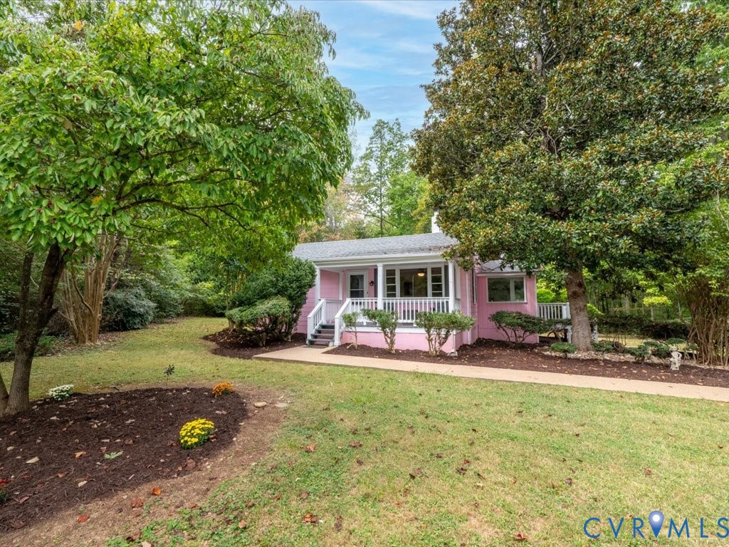 7068 Porters Road Esmont, VA 22937 - Photo 2 of 37 a view of a house with backyard porch and sitting area
