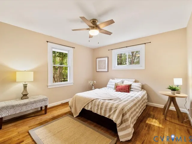 a view of a dining room with furniture and a window