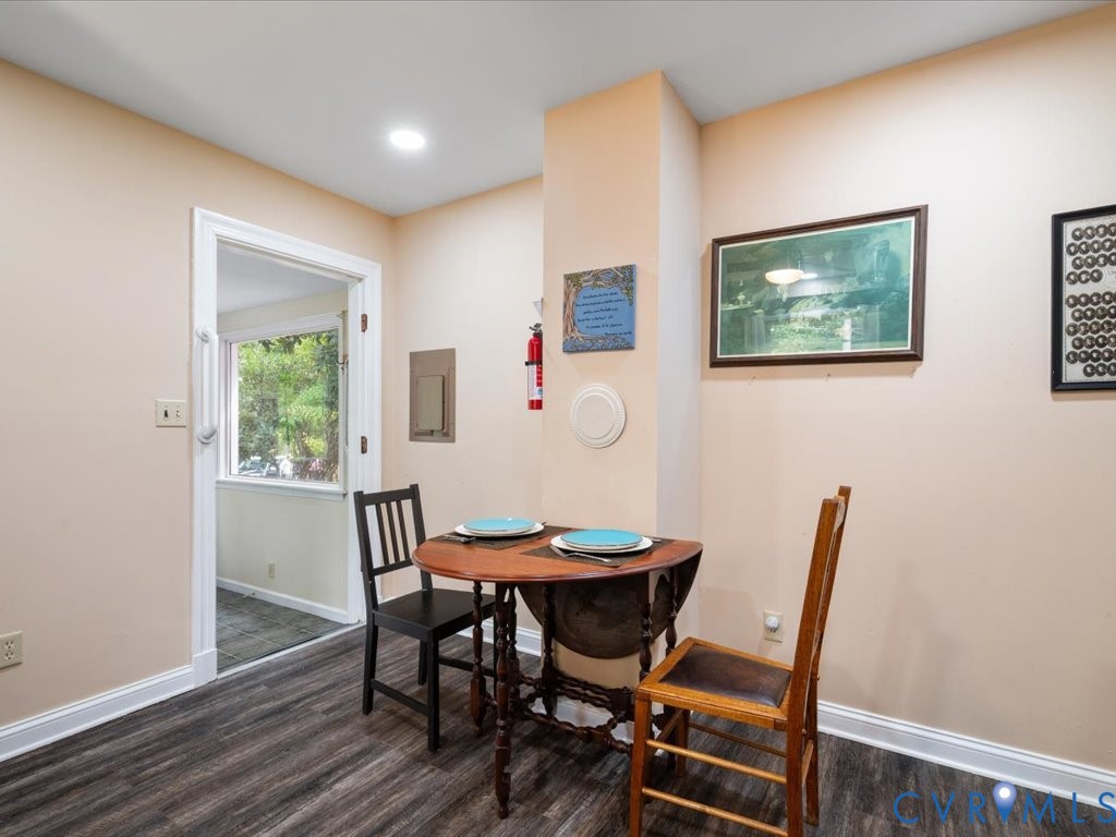 7068 Porters Road Esmont, VA 22937 - Photo 30 of 37 a view of a dining room with furniture and a window