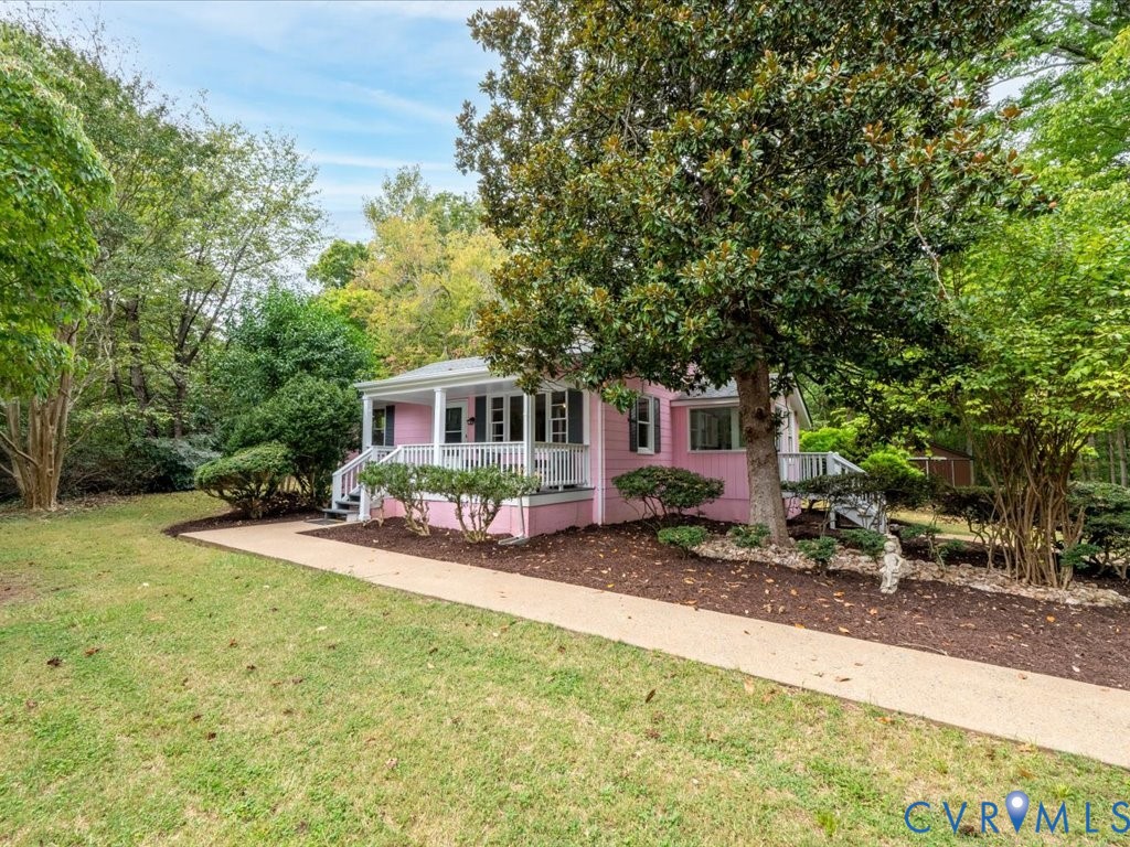 7068 Porters Road Esmont, VA 22937 - Photo 4 of 37 a view of a house with backyard and sitting area