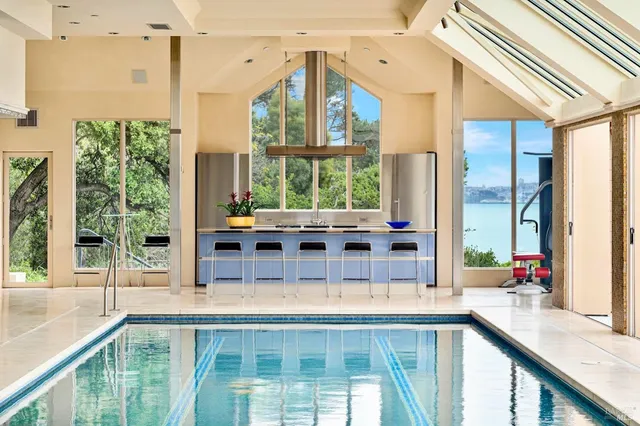 a view of a balcony with dining area