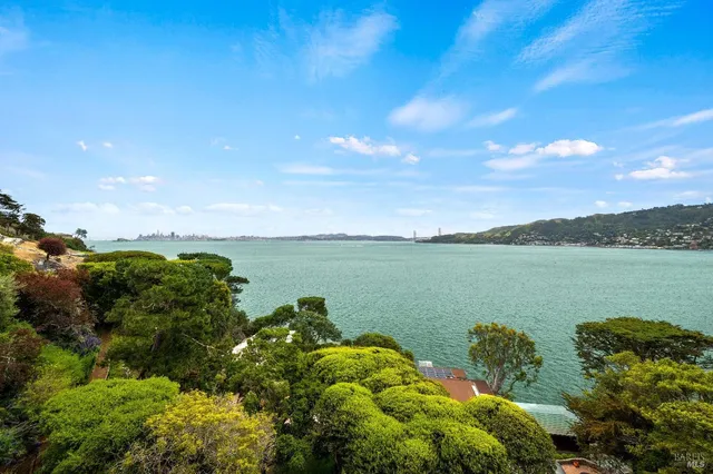 a view of a lake with a big yard