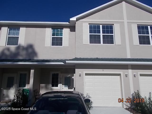 3737 Chambers Lane, Unit 3 Cocoa, FL 32926 - Photo 1 of 25 a front view of a house with a garden