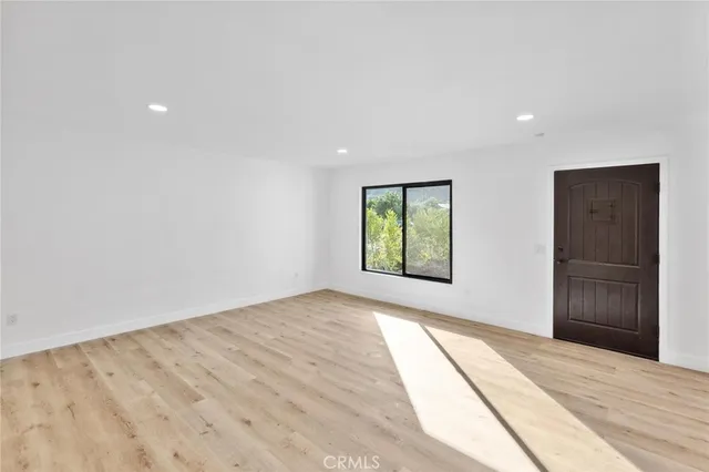 a view of an empty room and window