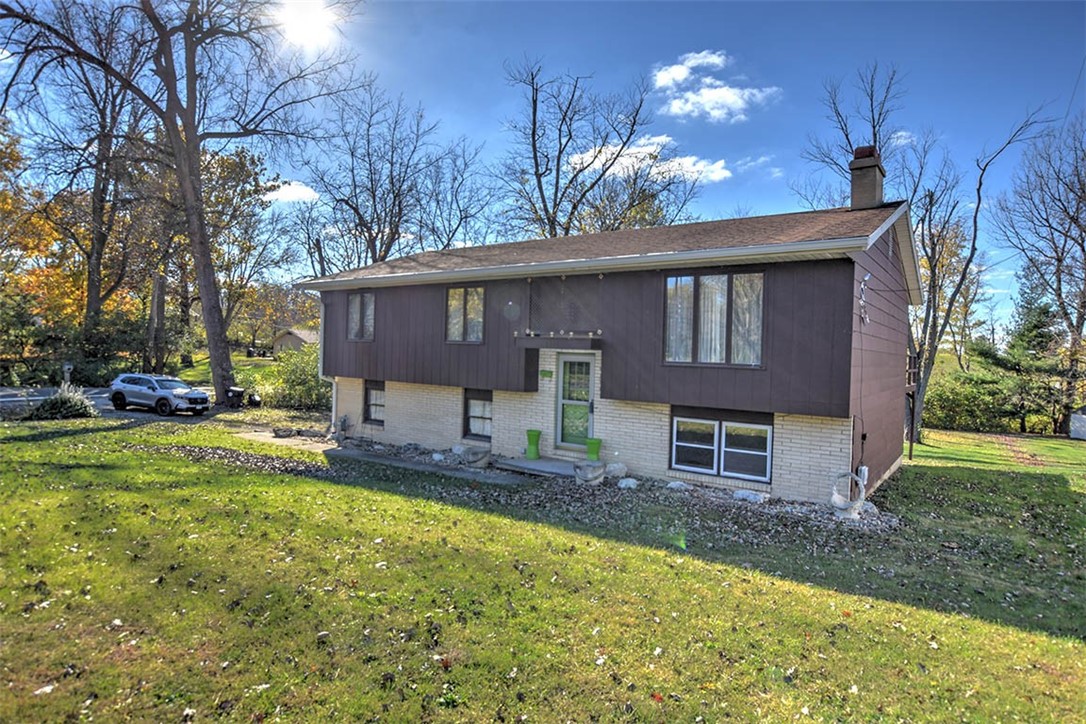 3441 Ferris Drive Decatur, IL 62521 - Photo 24 of 30 a view of a house with a yard patio and fire pit