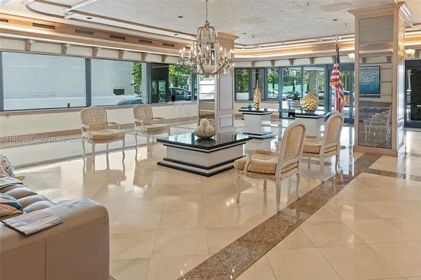 a view of a building with a yard