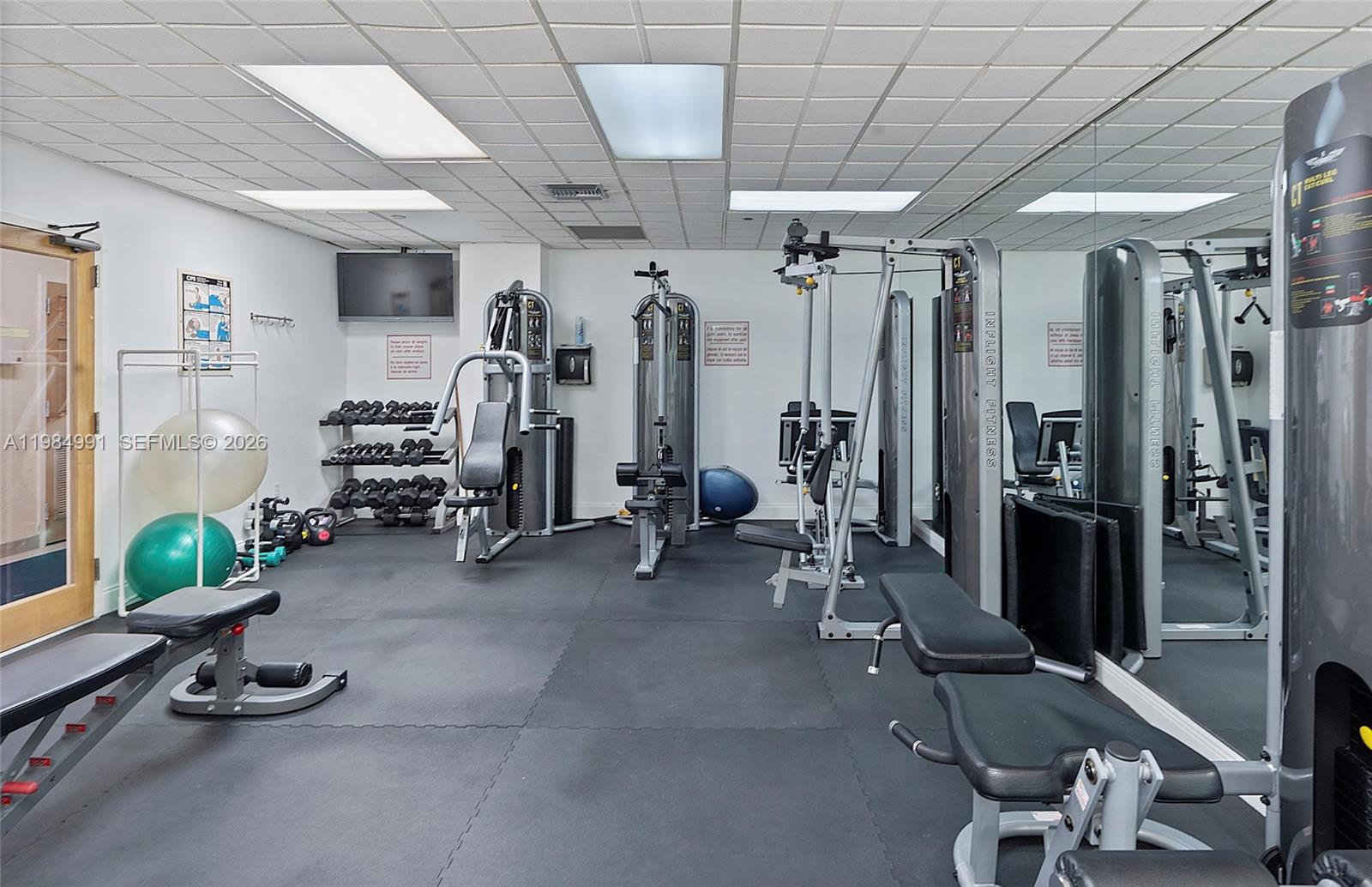 9455 Collins Avenue, Unit 409 Surfside, FL 33154 - Photo 33 of 46 a view of a room with gym equipment