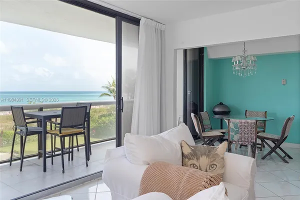 a living room with furniture and a window