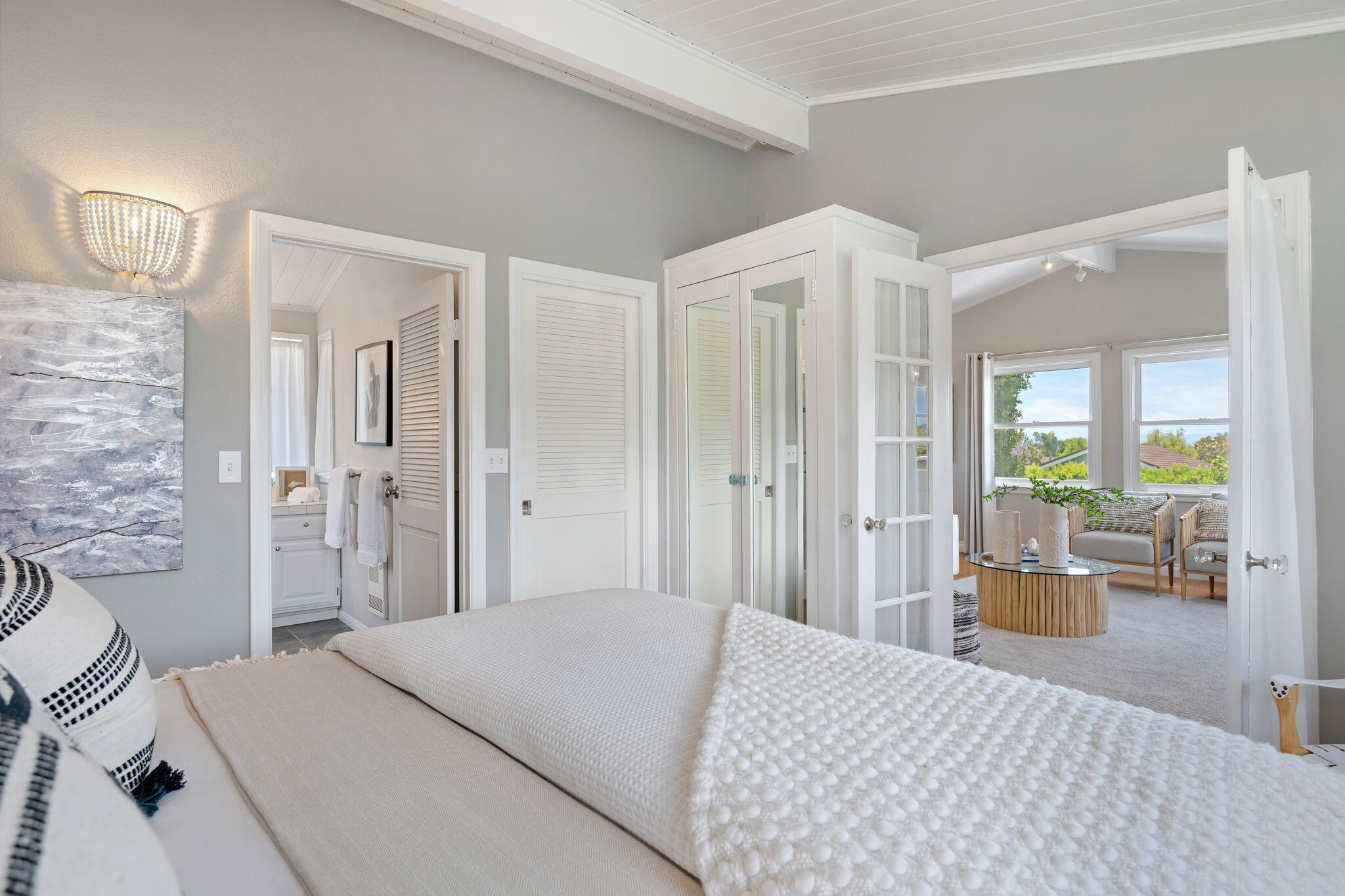2129 Red Rose Way Santa Barbara, CA 93109 - Photo 20 of 44 a bedroom with a bed and a large mirror