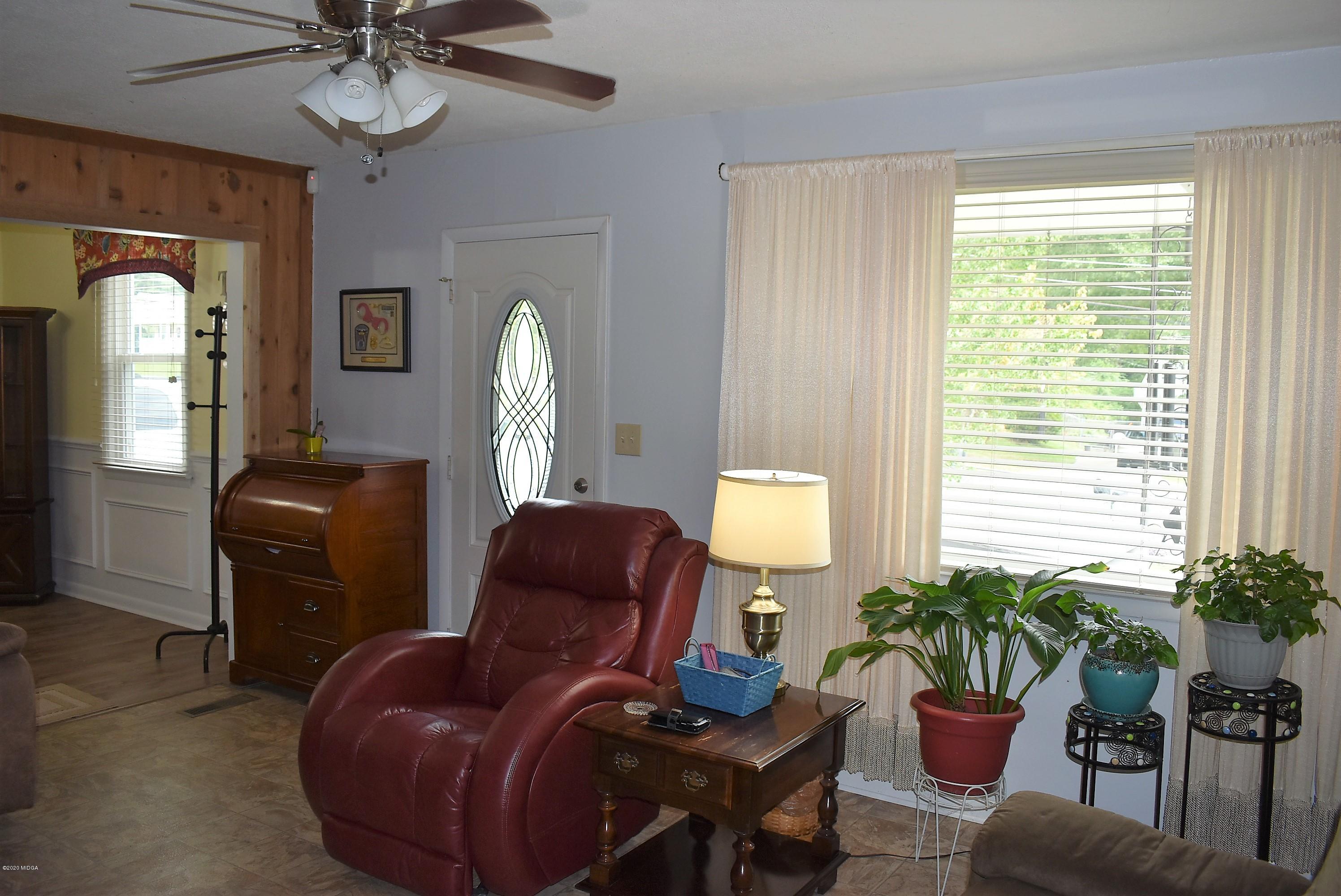 4825 Brookhaven Road Macon, GA 31206 - Photo 23 of 30 a living room with furniture and a large window
